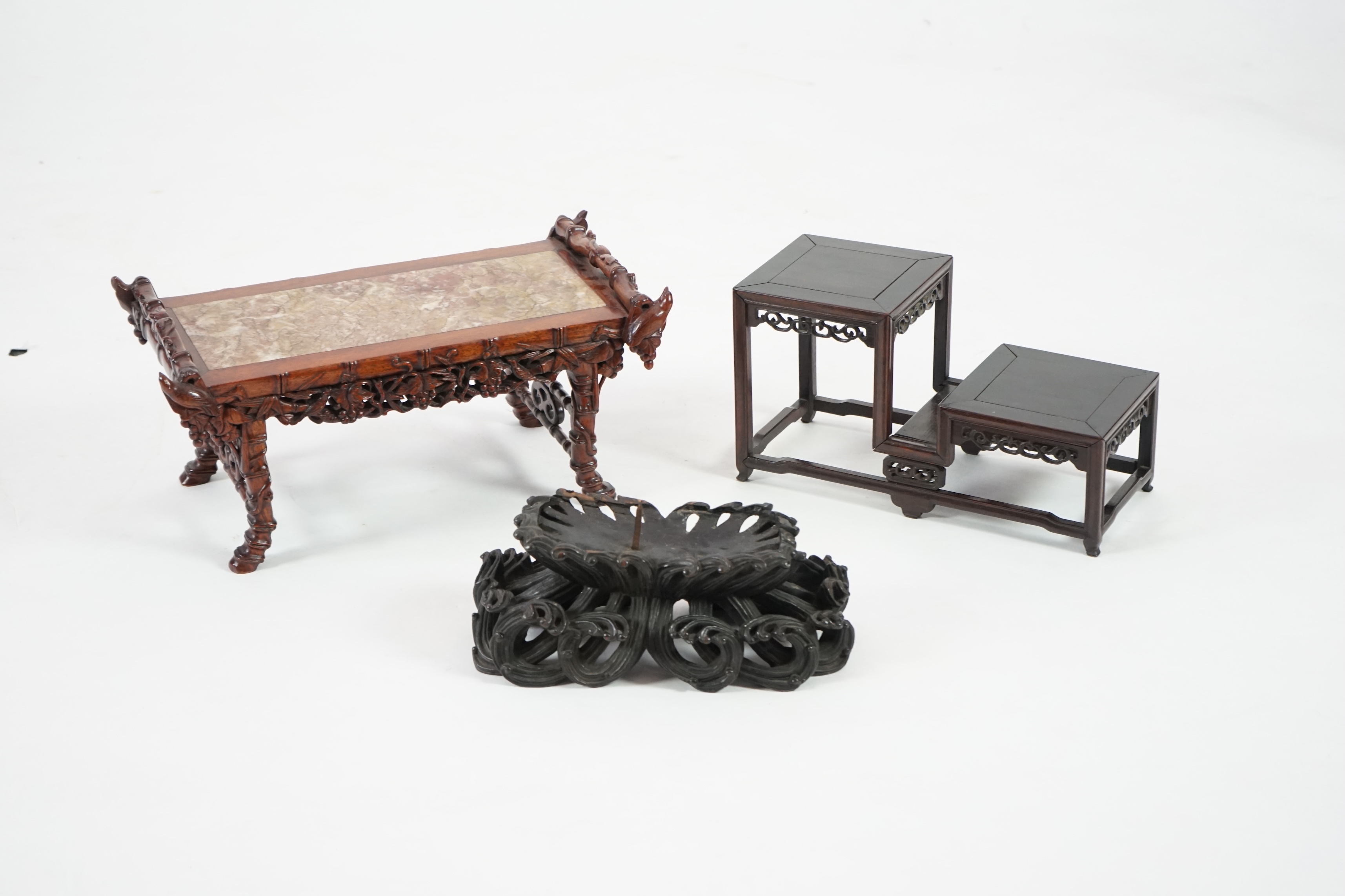 Three Chinese carved wood stands, 19th/early 20th century